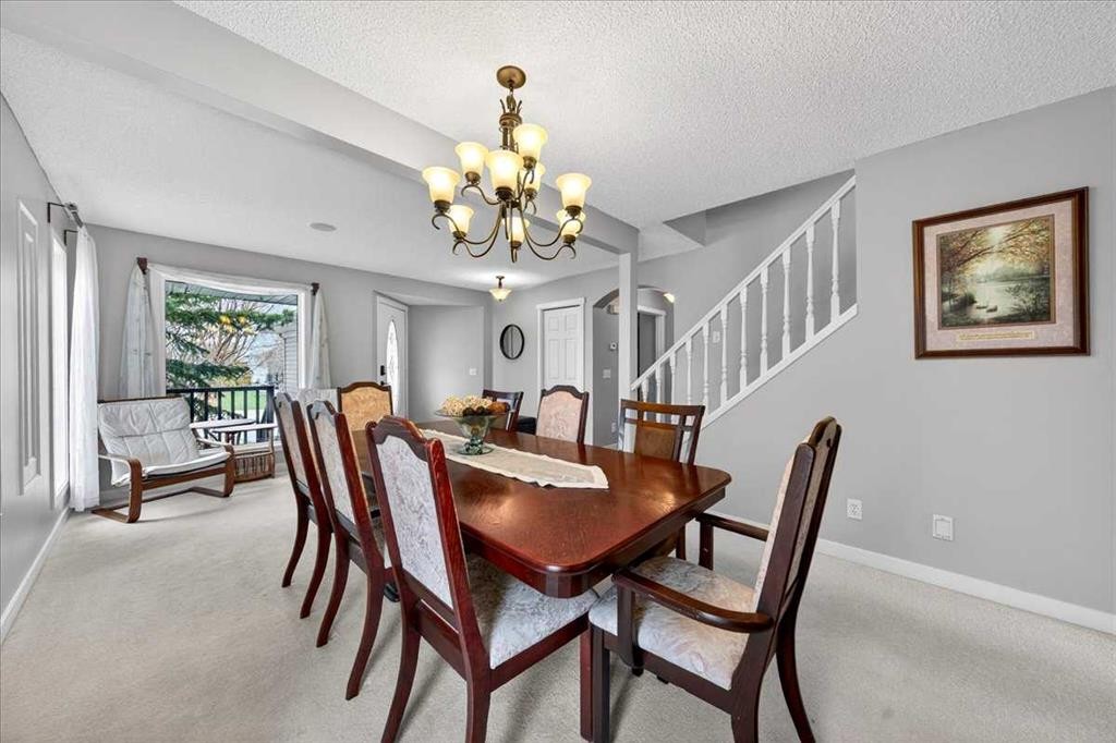 127 Hidden Ranch Terrace Nw, Calgary, AB - Indoor Photo Showing Dining Room