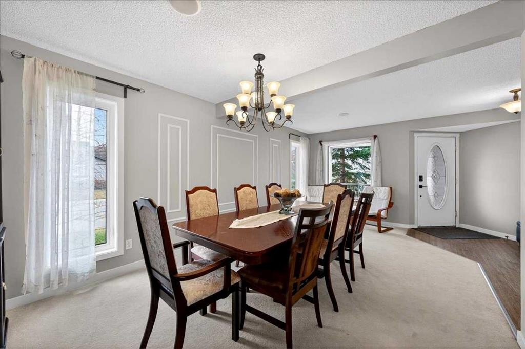 127 Hidden Ranch Terrace Nw, Calgary, AB - Indoor Photo Showing Dining Room