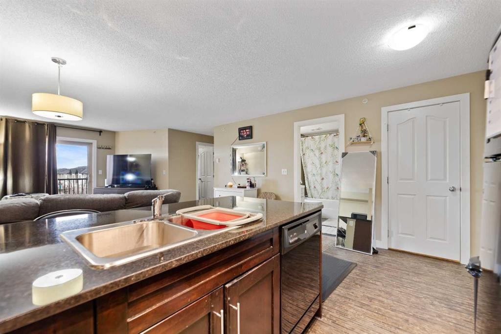 404-355 Taralake Way Ne, Calgary, AB - Indoor Photo Showing Kitchen With Double Sink