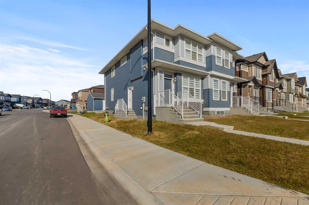 281 Creekside Boulevard Sw, Calgary, AB - Outdoor With Facade