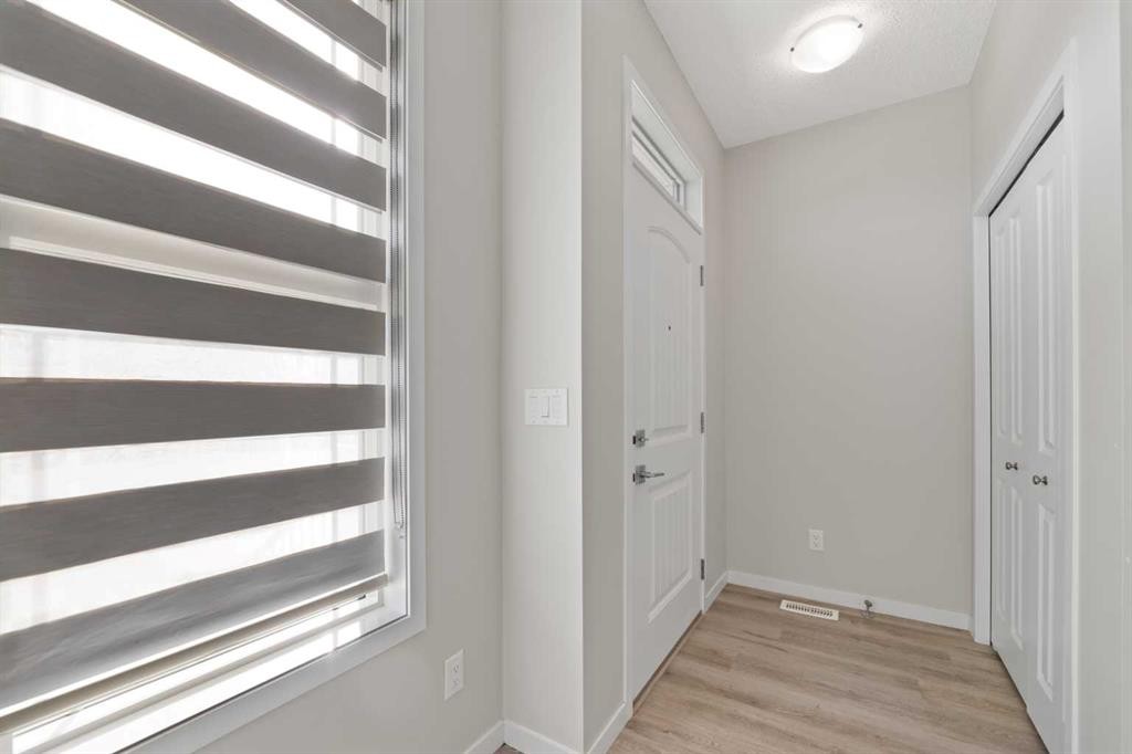 281 Creekside Boulevard Sw, Calgary, AB - Indoor Photo Showing Other Room