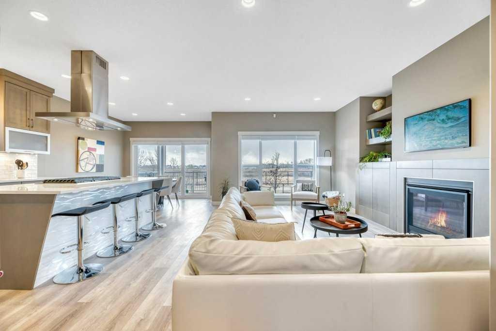 261 Wildrose Drive, Strathmore, AB - Indoor Photo Showing Living Room With Fireplace