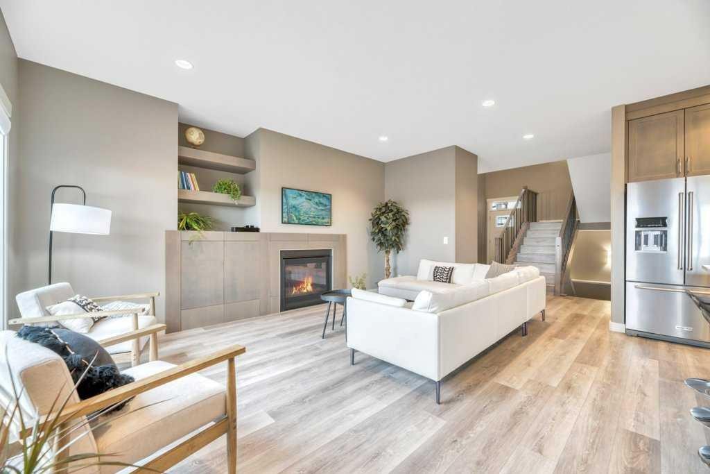 261 Wildrose Drive, Strathmore, AB - Indoor Photo Showing Living Room With Fireplace