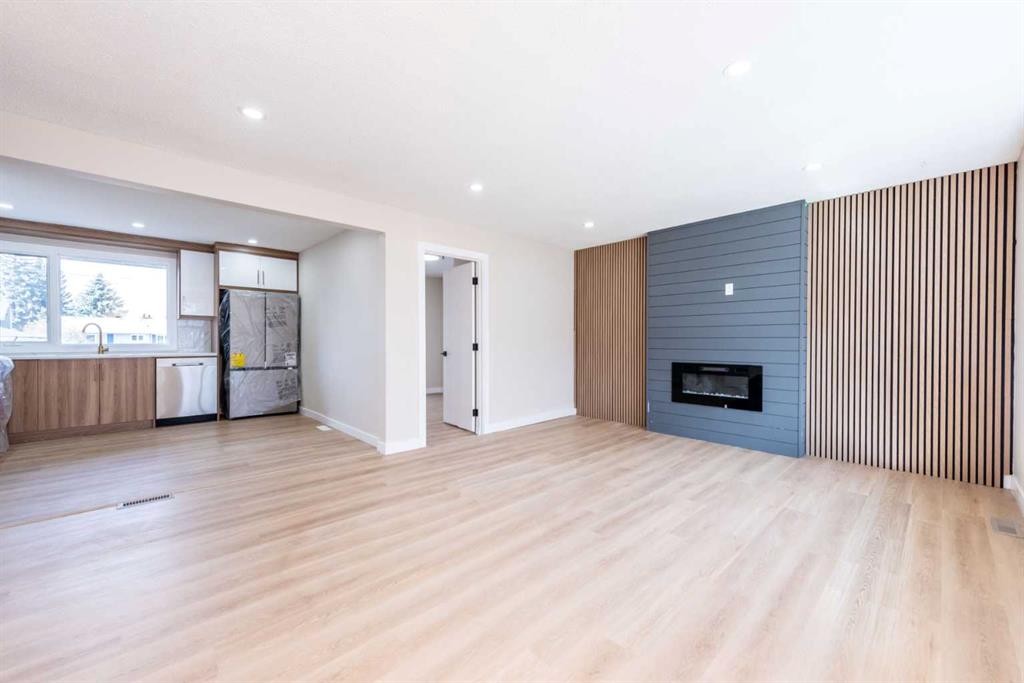 46 Marbrooke Circle Ne, Calgary, AB - Indoor Photo Showing Living Room With Fireplace