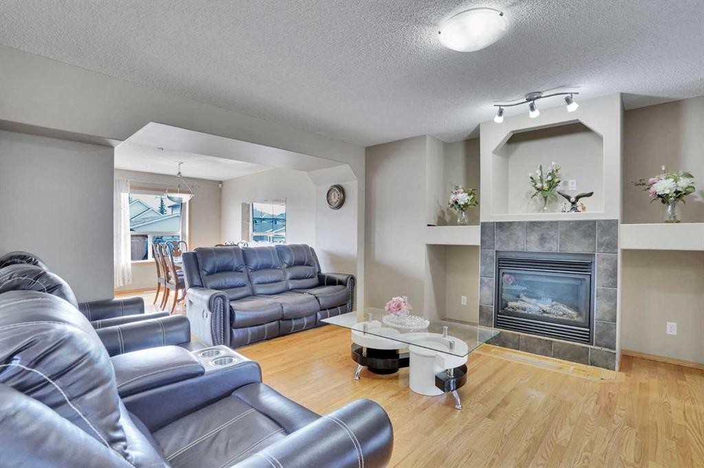 75 Taralea Crescent Ne, Calgary, AB - Indoor Photo Showing Living Room With Fireplace