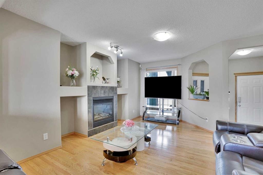 75 Taralea Crescent Ne, Calgary, AB - Indoor Photo Showing Living Room With Fireplace