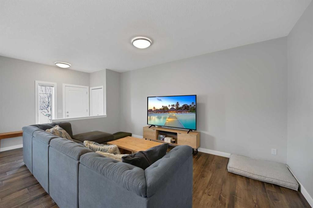 1167 Channelside Drive Sw, Airdrie, AB - Indoor Photo Showing Living Room