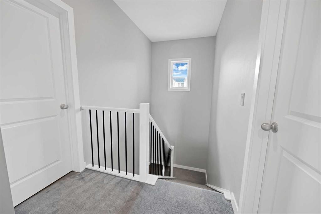 1167 Channelside Drive Sw, Airdrie, AB - Indoor Photo Showing Other Room