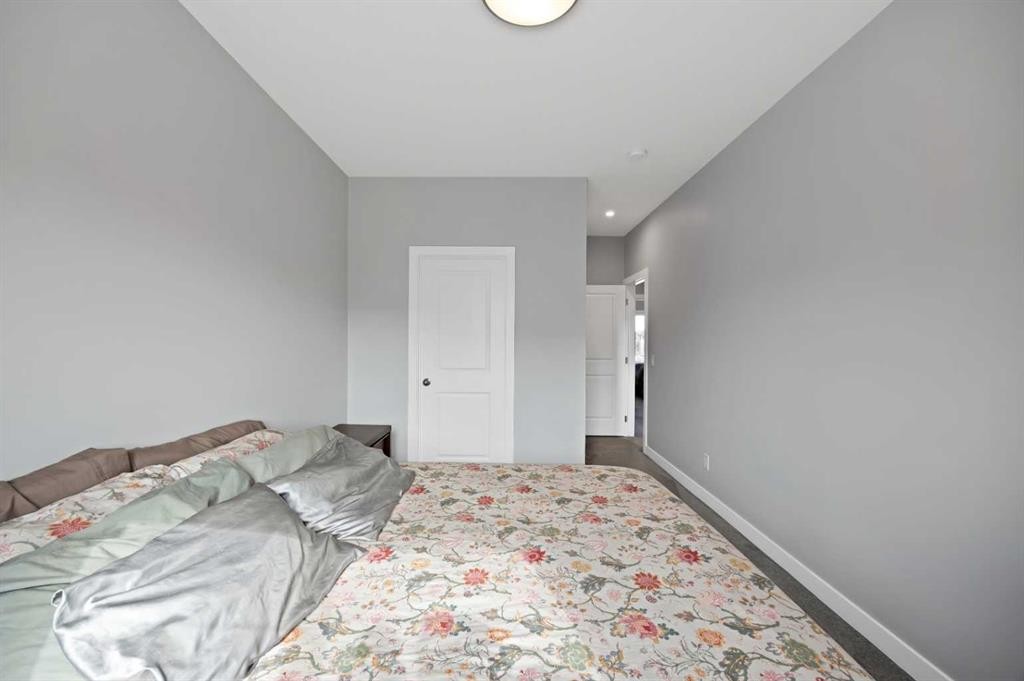 1167 Channelside Drive Sw, Airdrie, AB - Indoor Photo Showing Bedroom