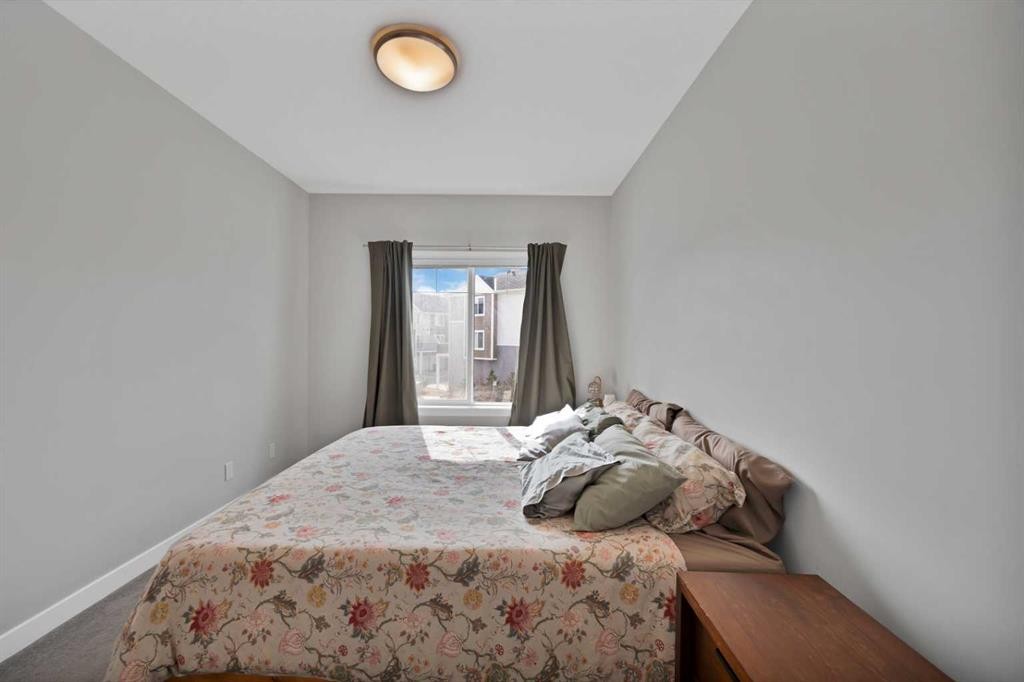 1167 Channelside Drive Sw, Airdrie, AB - Indoor Photo Showing Bedroom