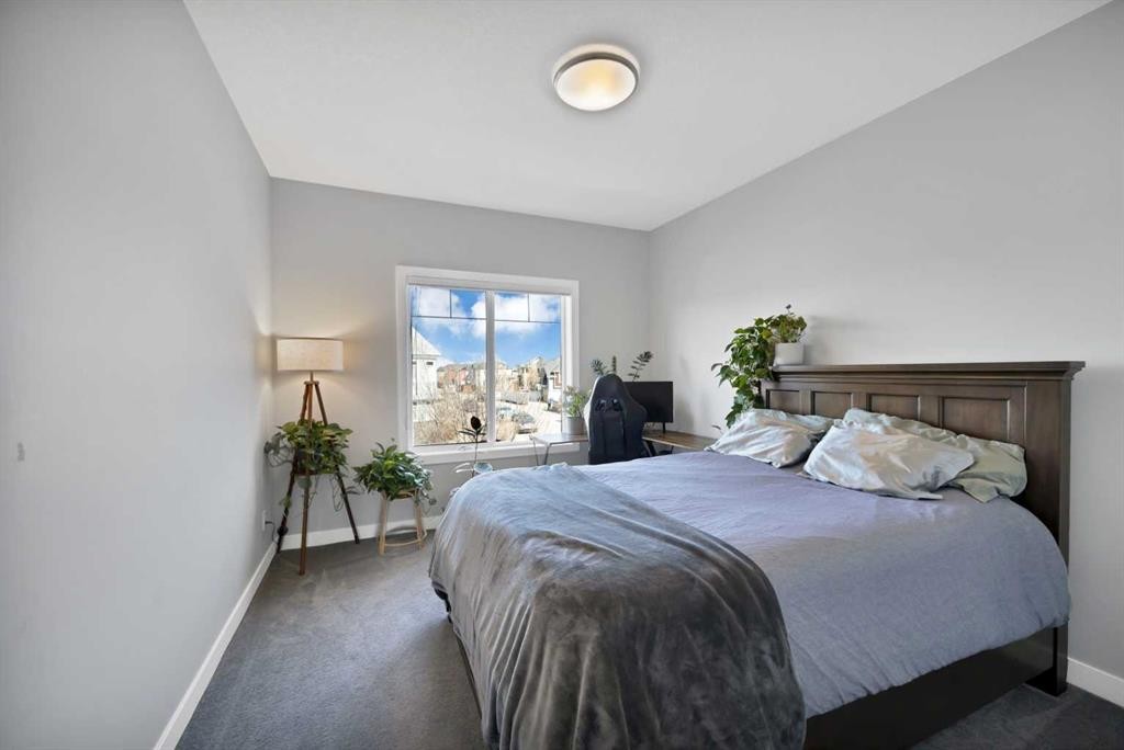 1167 Channelside Drive Sw, Airdrie, AB - Indoor Photo Showing Bedroom