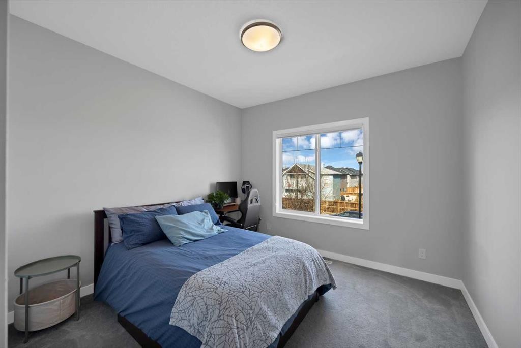 1167 Channelside Drive Sw, Airdrie, AB - Indoor Photo Showing Bedroom
