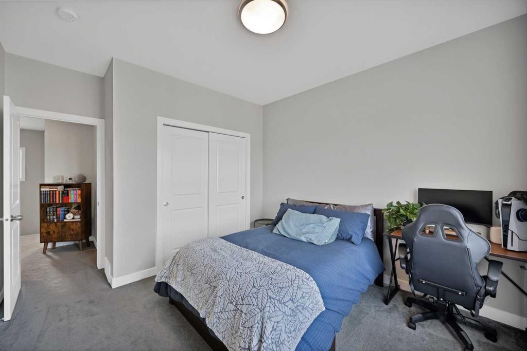 1167 Channelside Drive Sw, Airdrie, AB - Indoor Photo Showing Bedroom