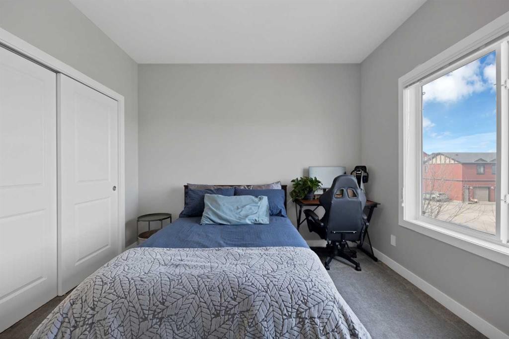 1167 Channelside Drive Sw, Airdrie, AB - Indoor Photo Showing Bedroom