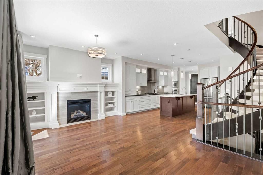 2427 22A Street Nw, Calgary, AB - Indoor Photo Showing Other Room With Fireplace