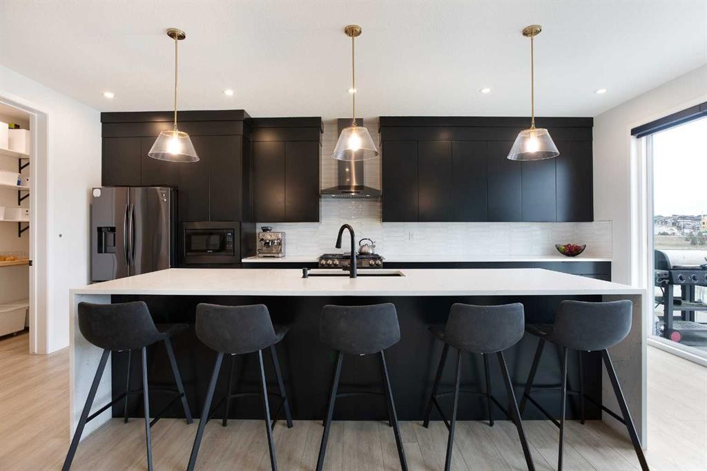 206 Rowley Way Nw, Calgary, AB - Indoor Photo Showing Kitchen With Upgraded Kitchen