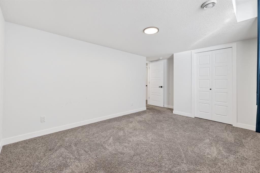208 Dawson Circle, Chestermere, AB - Indoor Photo Showing Other Room