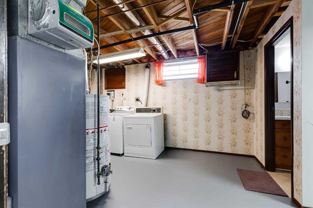 248 Huntcroft Road Ne, Calgary, AB - Indoor Photo Showing Laundry Room