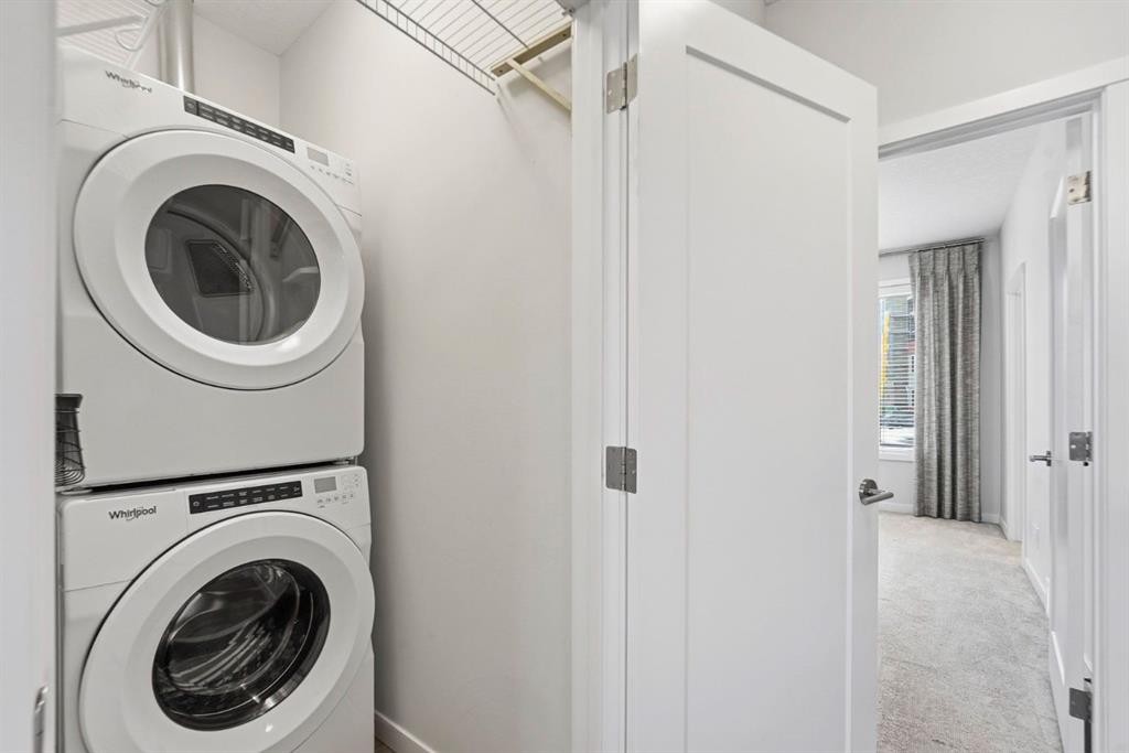 84 Shawnee Common Sw, Calgary, AB - Indoor Photo Showing Laundry Room