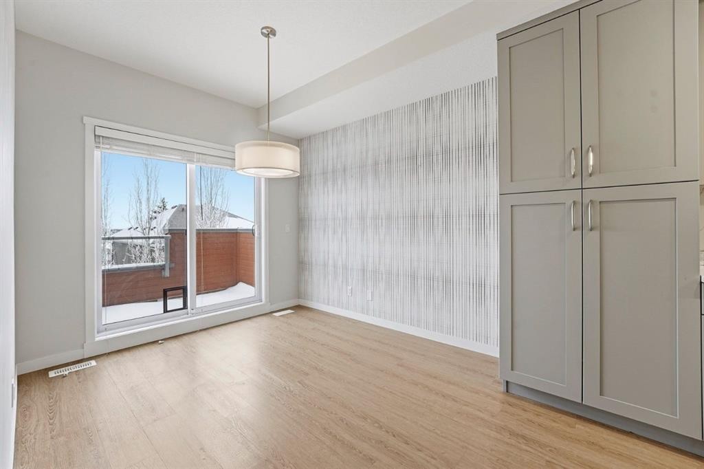 84 Shawnee Common Sw, Calgary, AB - Indoor Photo Showing Other Room