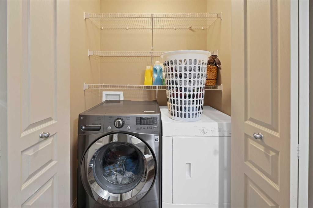 10 Bridlerange Circle Sw, Calgary, AB - Indoor Photo Showing Laundry Room