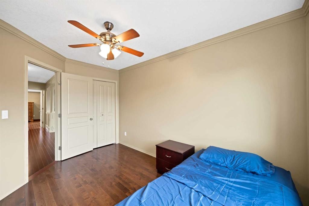 10 Bridlerange Circle Sw, Calgary, AB - Indoor Photo Showing Bedroom