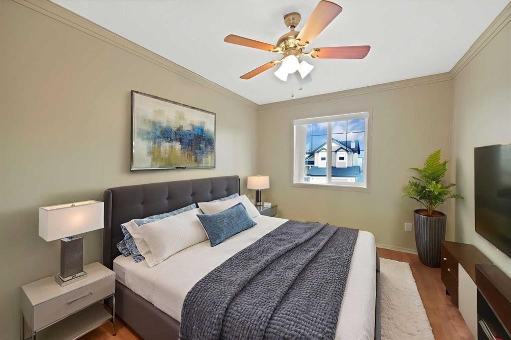 10 Bridlerange Circle Sw, Calgary, AB - Indoor Photo Showing Bedroom