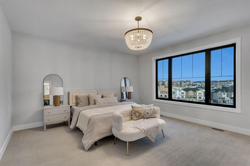 12 Spring Creek Point Sw, Calgary, AB - Indoor Photo Showing Bedroom