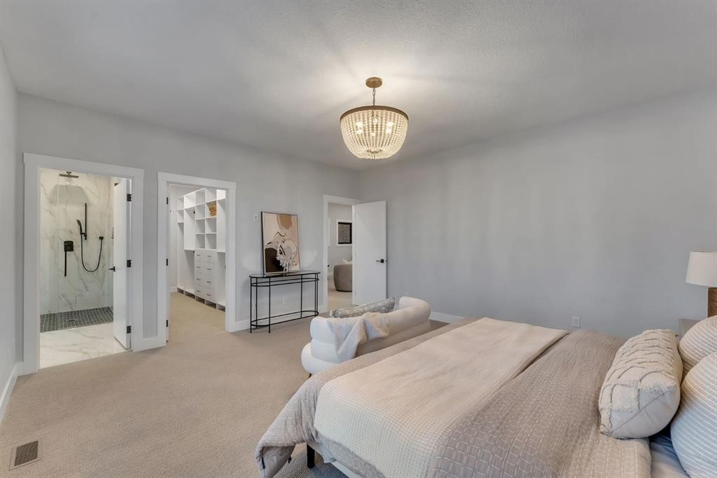 12 Spring Creek Point Sw, Calgary, AB - Indoor Photo Showing Bedroom