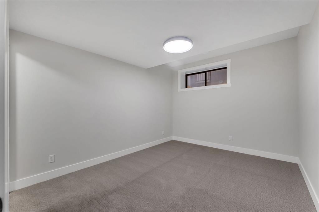 12 Spring Creek Point Sw, Calgary, AB - Indoor Photo Showing Other Room