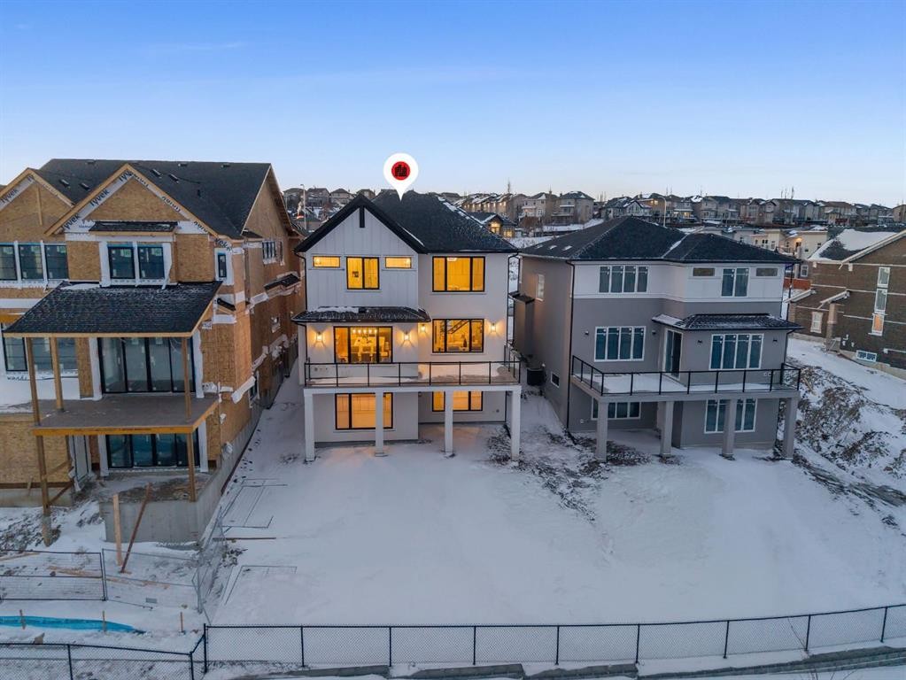 12 Spring Creek Point Sw, Calgary, AB - Outdoor With Deck Patio Veranda With Facade