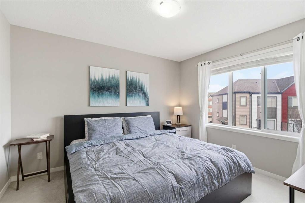 150 Copperpond Villas Se, Calgary, AB - Indoor Photo Showing Bedroom