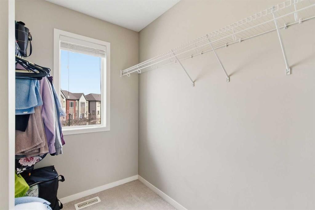 150 Copperpond Villas Se, Calgary, AB - Indoor With Storage