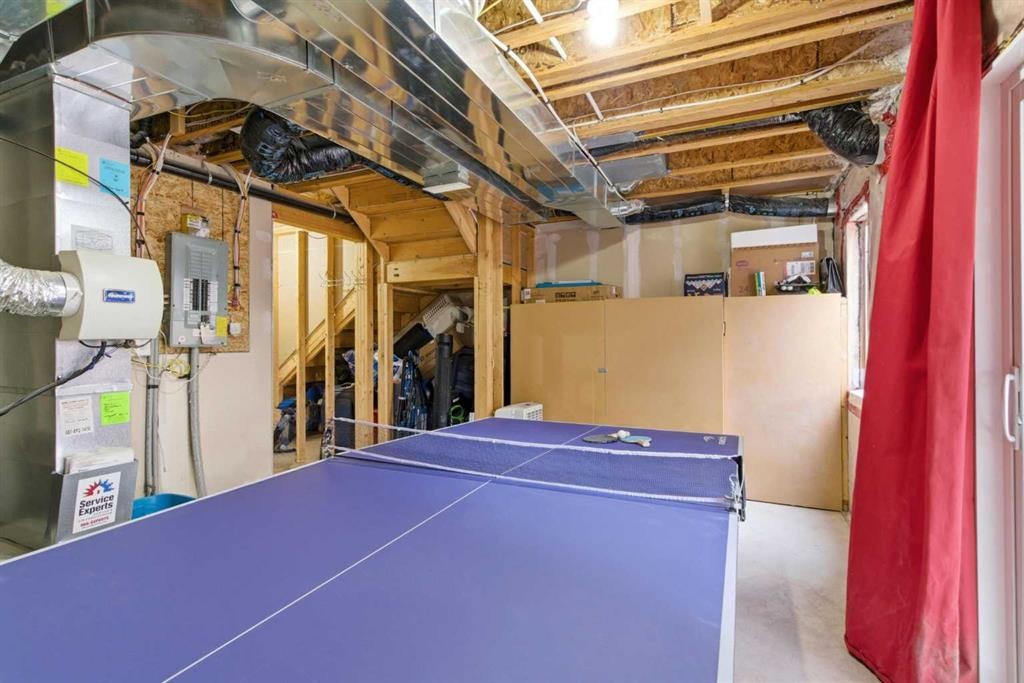 150 Copperpond Villas Se, Calgary, AB - Indoor Photo Showing Basement