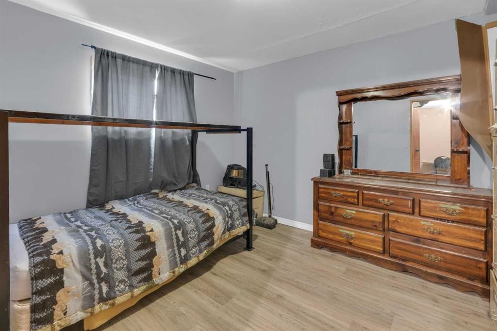 23 Beaver Place, Beiseker, AB - Indoor Photo Showing Bedroom