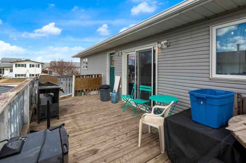 23 Beaver Place, Beiseker, AB - Outdoor With Deck Patio Veranda With Exterior
