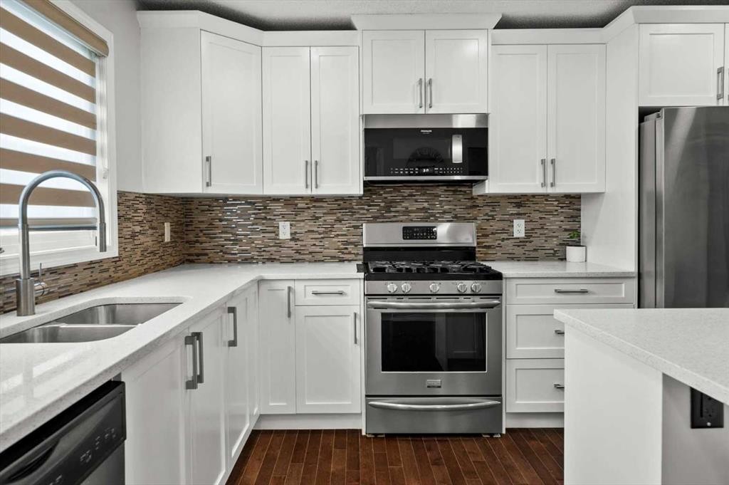 48 Walgrove Green Se, Calgary, AB - Indoor Photo Showing Kitchen With Stainless Steel Kitchen With Double Sink With Upgraded Kitchen