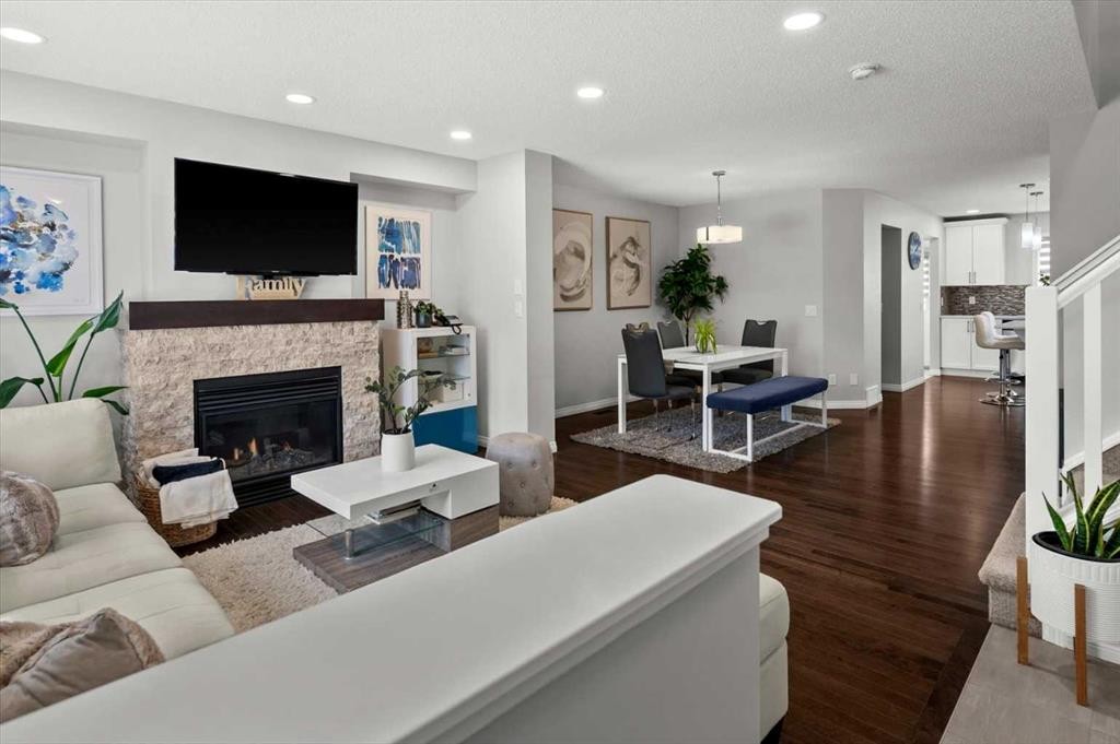 48 Walgrove Green Se, Calgary, AB - Indoor Photo Showing Living Room With Fireplace