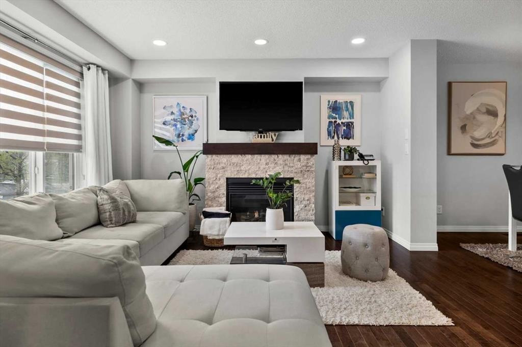 48 Walgrove Green Se, Calgary, AB - Indoor Photo Showing Living Room With Fireplace