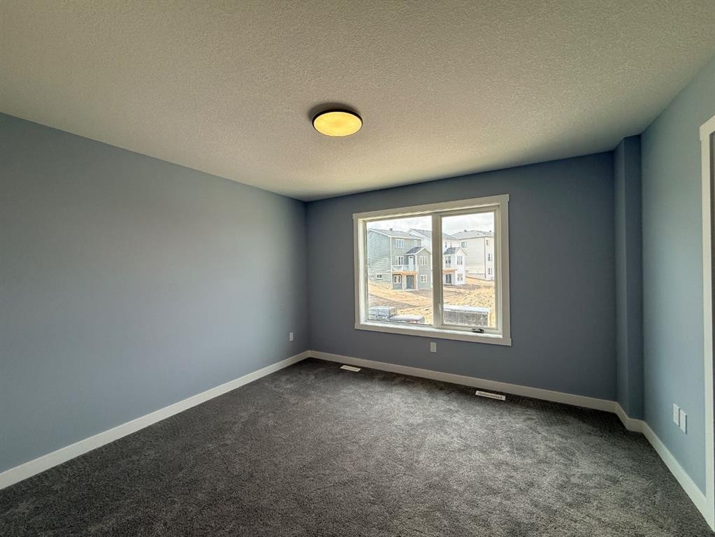 1995 Mccaskill Drive, Crossfield, AB - Indoor Photo Showing Other Room