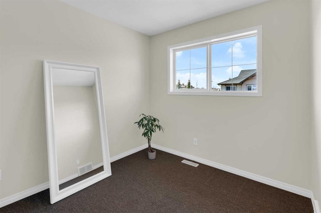 112 Ranch Ridge Meadow, Strathmore, AB - Indoor Photo Showing Other Room