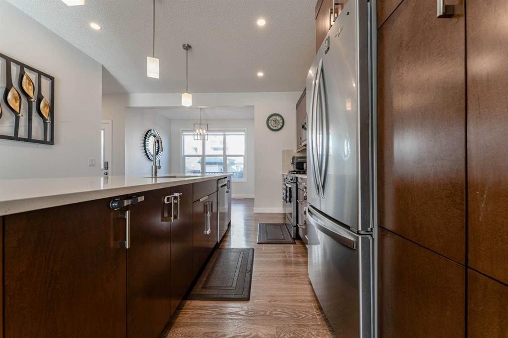 318 Masters Row Se, Calgary, AB - Indoor Photo Showing Kitchen With Upgraded Kitchen