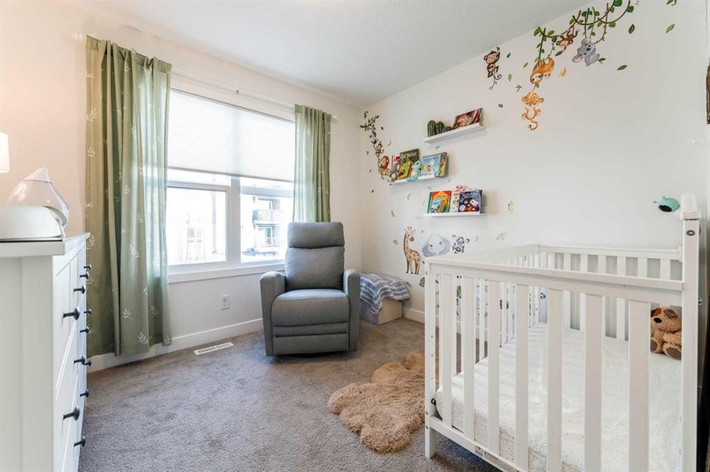 318 Masters Row Se, Calgary, AB - Indoor Photo Showing Bedroom