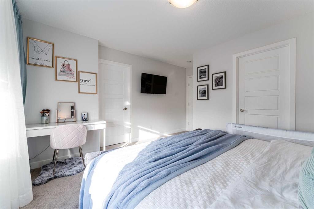318 Masters Row Se, Calgary, AB - Indoor Photo Showing Bedroom