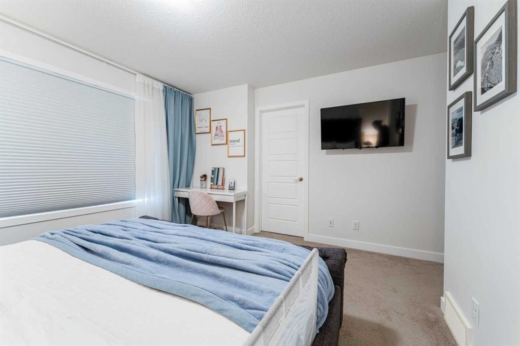 318 Masters Row Se, Calgary, AB - Indoor Photo Showing Bedroom