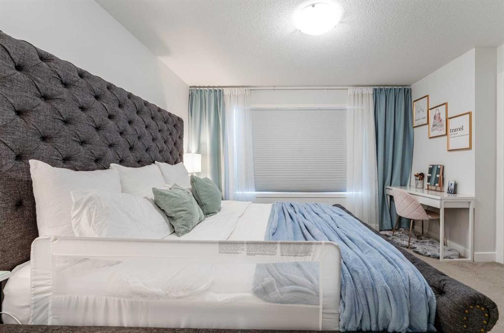 318 Masters Row Se, Calgary, AB - Indoor Photo Showing Bedroom