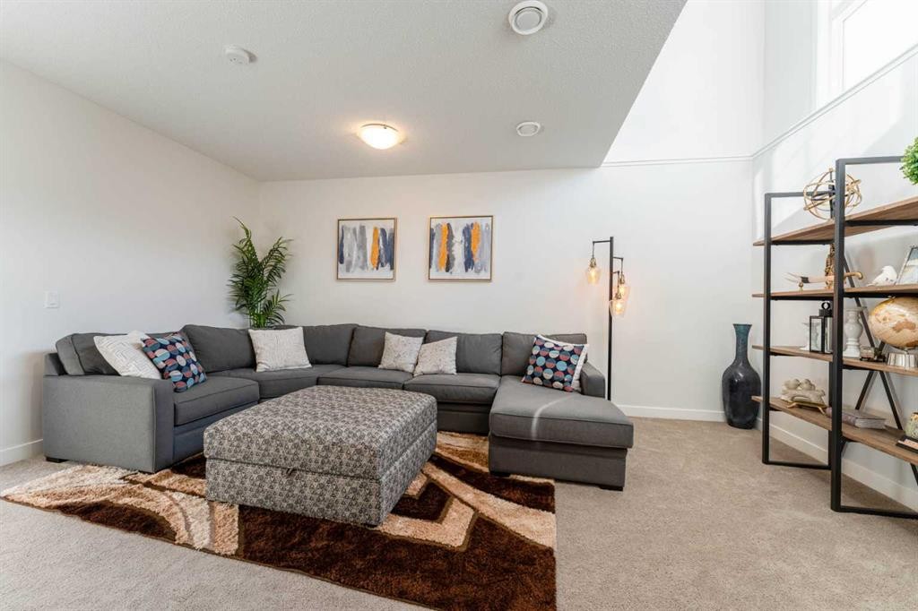 318 Masters Row Se, Calgary, AB - Indoor Photo Showing Living Room