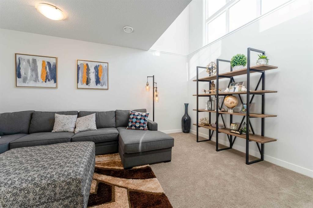 318 Masters Row Se, Calgary, AB - Indoor Photo Showing Living Room