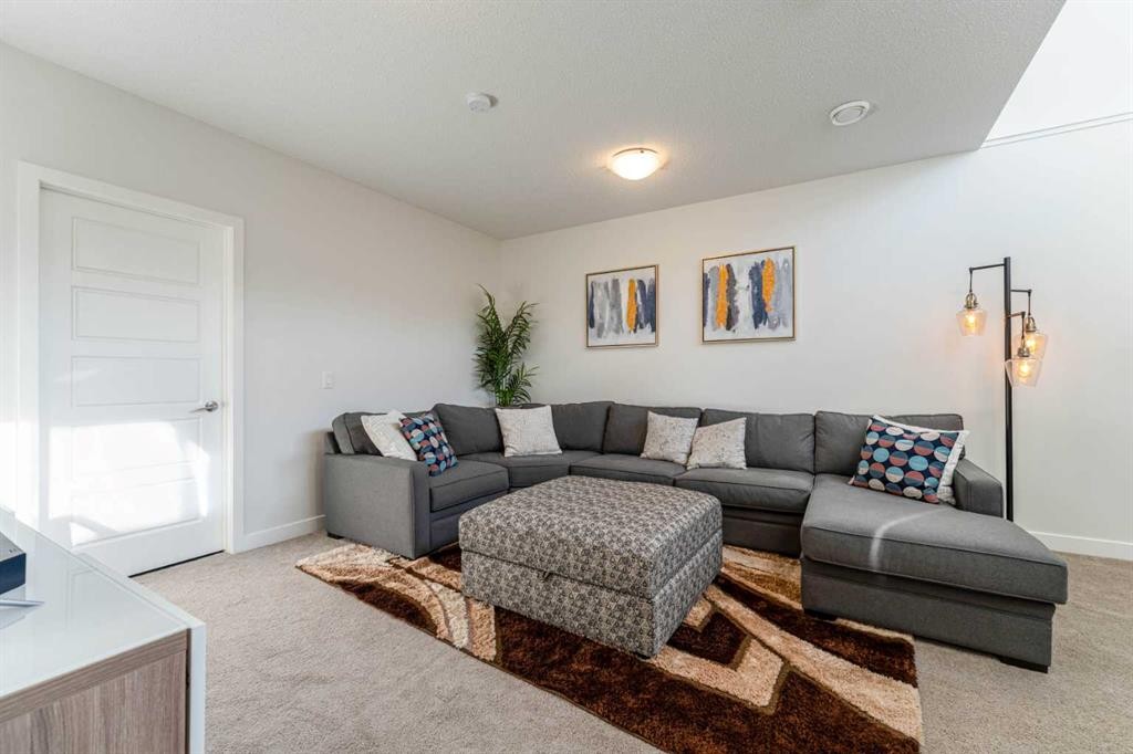 318 Masters Row Se, Calgary, AB - Indoor Photo Showing Living Room