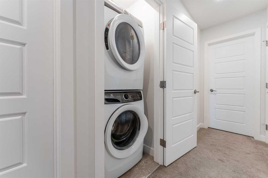 318 Masters Row Se, Calgary, AB - Indoor Photo Showing Laundry Room